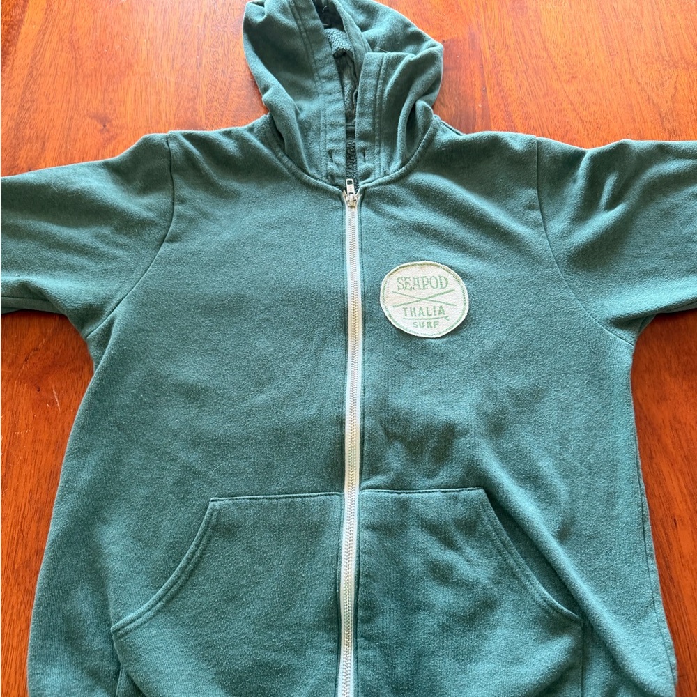 women’s green surf hoodie from Thalia surf shop in Laguna beach